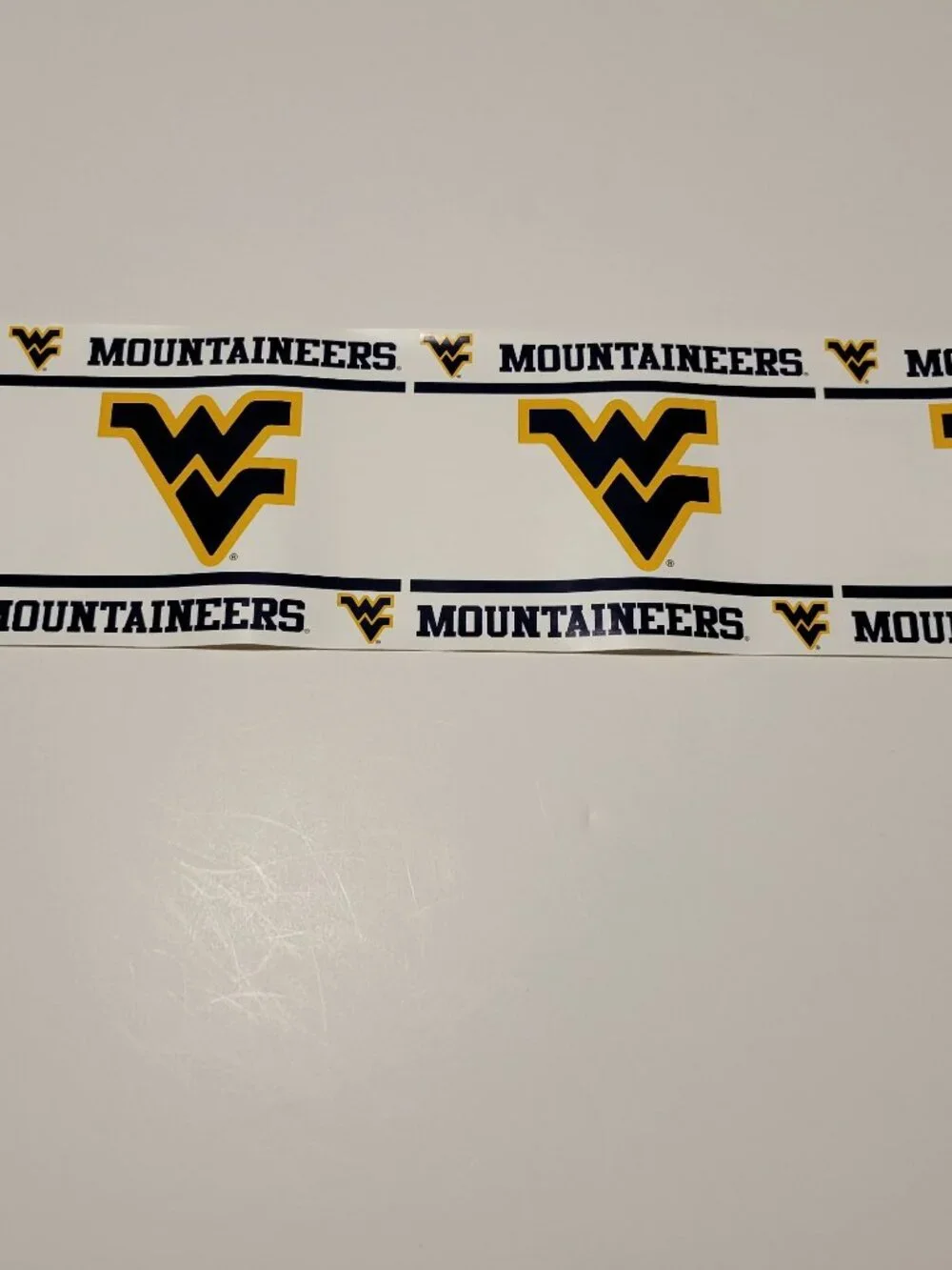 WEST VIRGINIA MOUNTAINEERS NCAA PEEL & STICK WALLPAPER BORDER. NEW